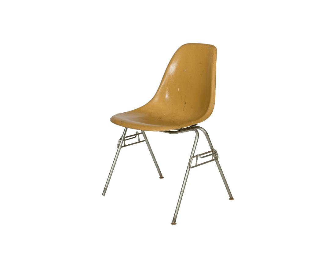 Charles Eames Fiberglass Side Chair: Description - A Charles Eames fiberglass side chair. Dimensions - 32" x 22" x 22"