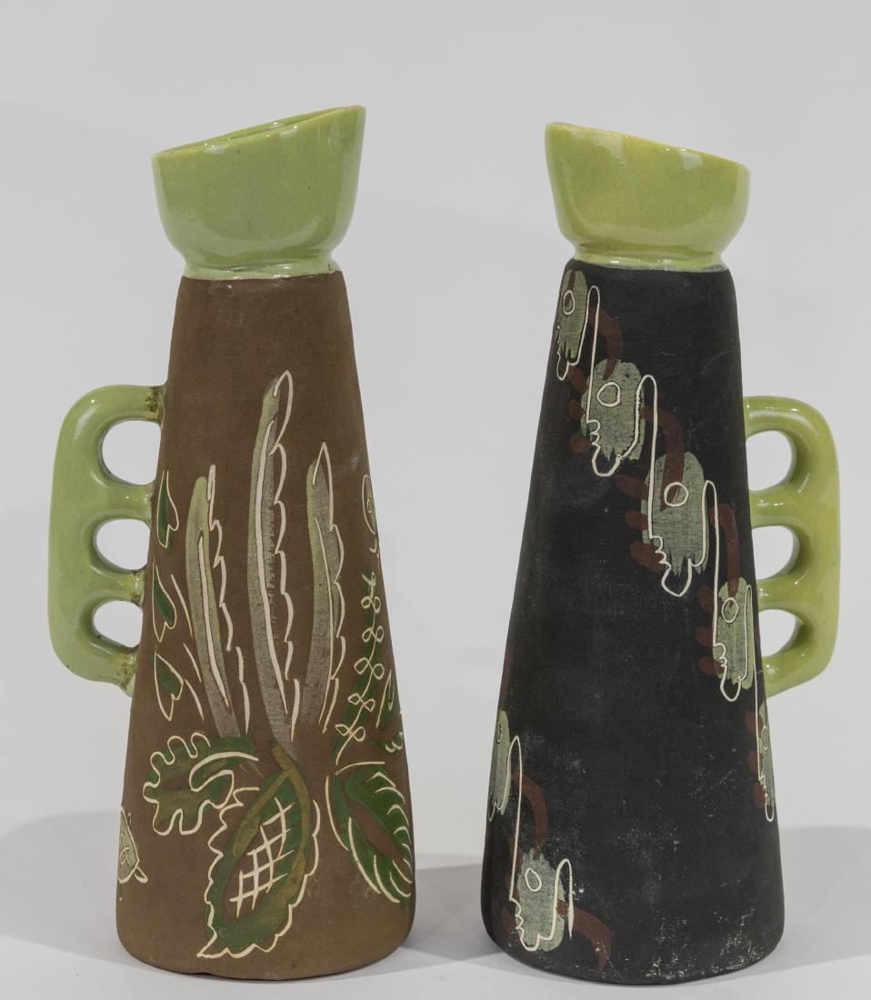 Pair Ceramic Chalice Pitchers: Description - A pair of ceramic chalice pitchers. Dimensions - Body - 11.5" tall