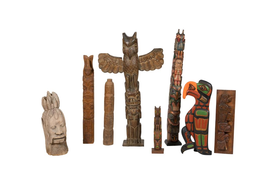 Group of Native Carvings and Totems - Eight: Descriptions - Group of eight Native carvings and totems. Dimensions - Totem with wings - 40" x 28" x 7"