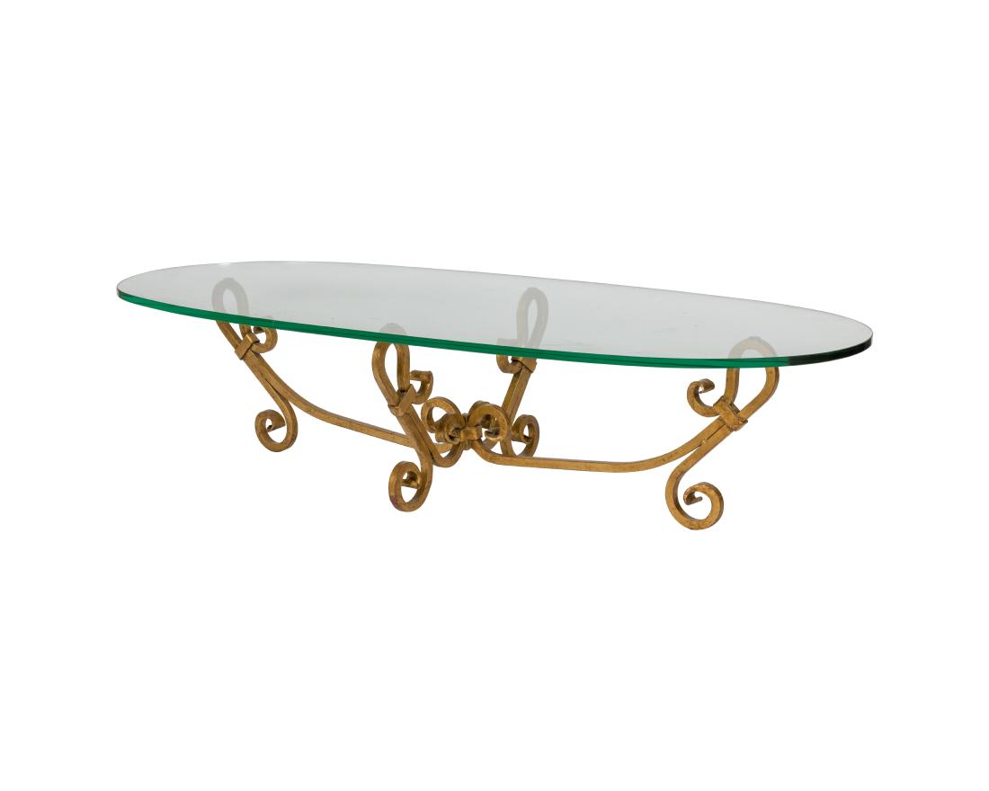 Gilt Iron Glass Top Coffee Table: Description - A gilt iron glass top coffee table. Dimensions - 16" x 70" x 29.5"