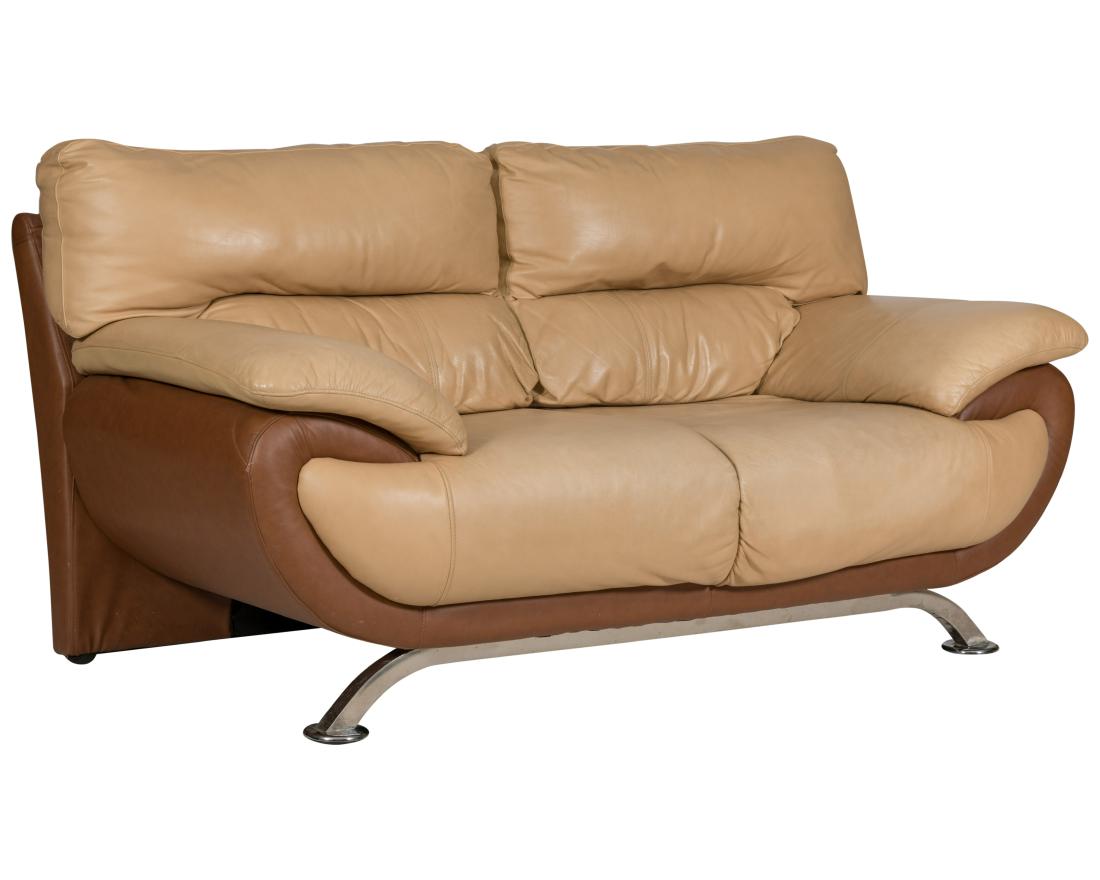 Leather Loveseat: Description - Leather loveseat with chrome legs. Dimensions - 37" x 68" x 38"