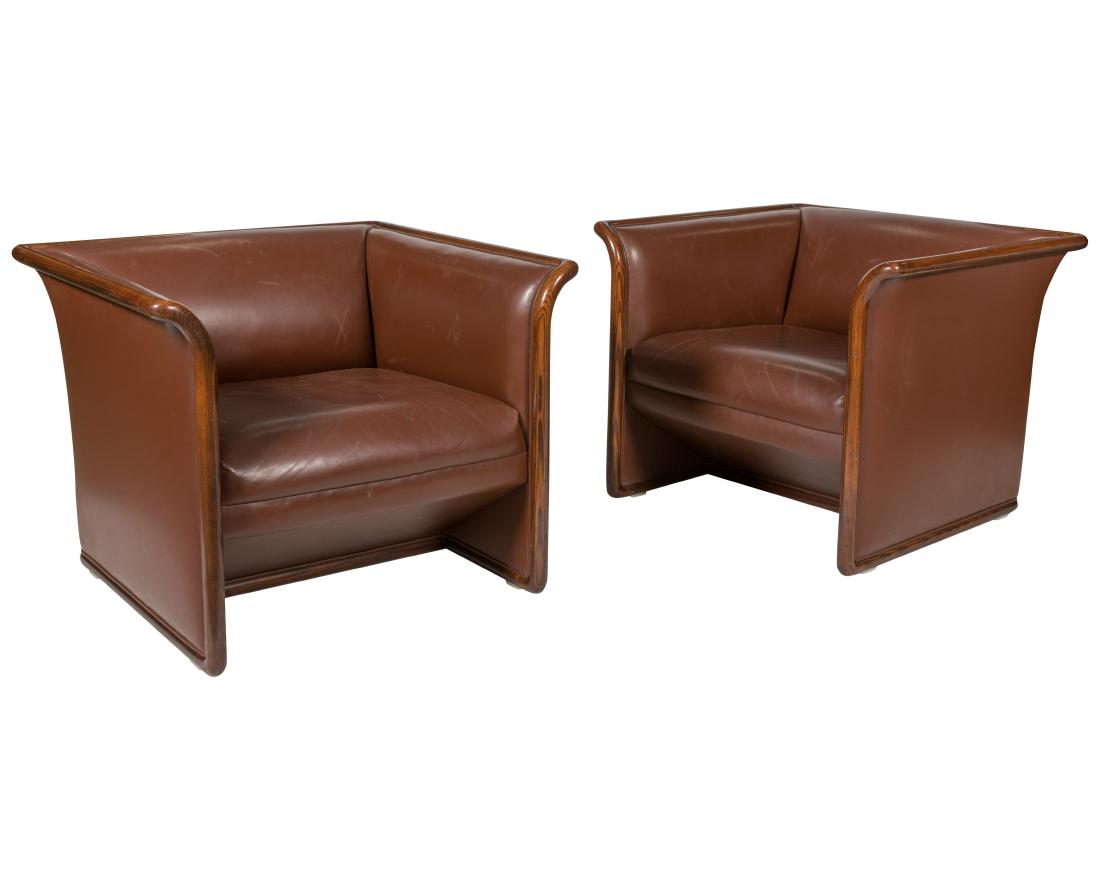 Ward Bennett for Brickel - Pair Leather Lounges: Description - A pair of leather lounge chairs by Ward Bennett for Brickel Associates. Possibly custom made for Dow Jones. Retains original label to underside. Dimensions - 25" x 32" x 30"