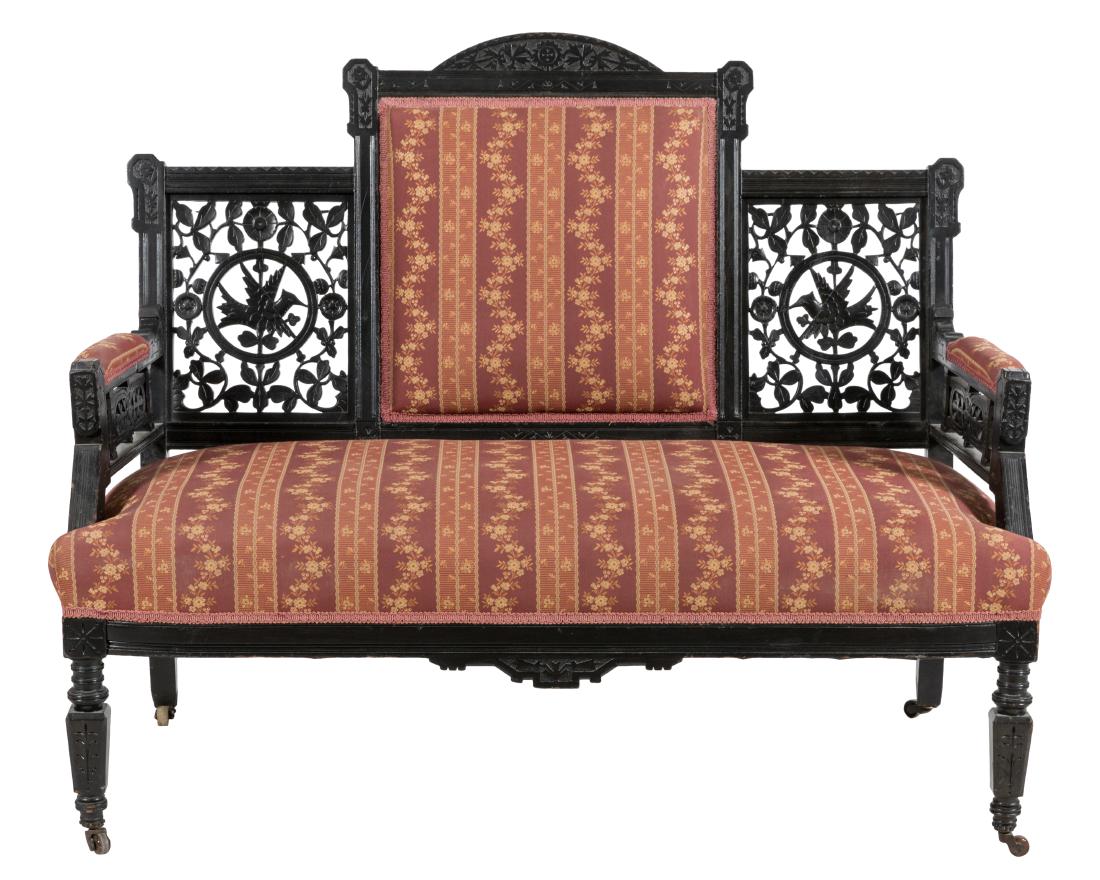 Ebonized Aesthetic Loveseat: Description - Ebonized aesthetic loveseat with carved birds. Dimensions - 37" x 46" x 24"