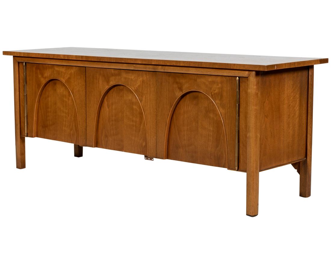 Walnut Credenza: Description - Walnut credenza with arched doors. Dimensions - 23" x 60" x 18"