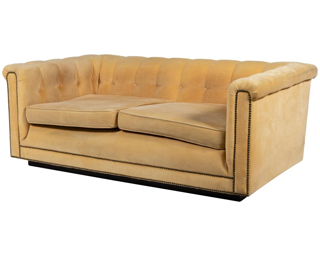 Hollywood Regency Loveseat: Description - Hollywood Regency tufted and studded plinth loveseat. Dimensions - 26" x 68" x 38"