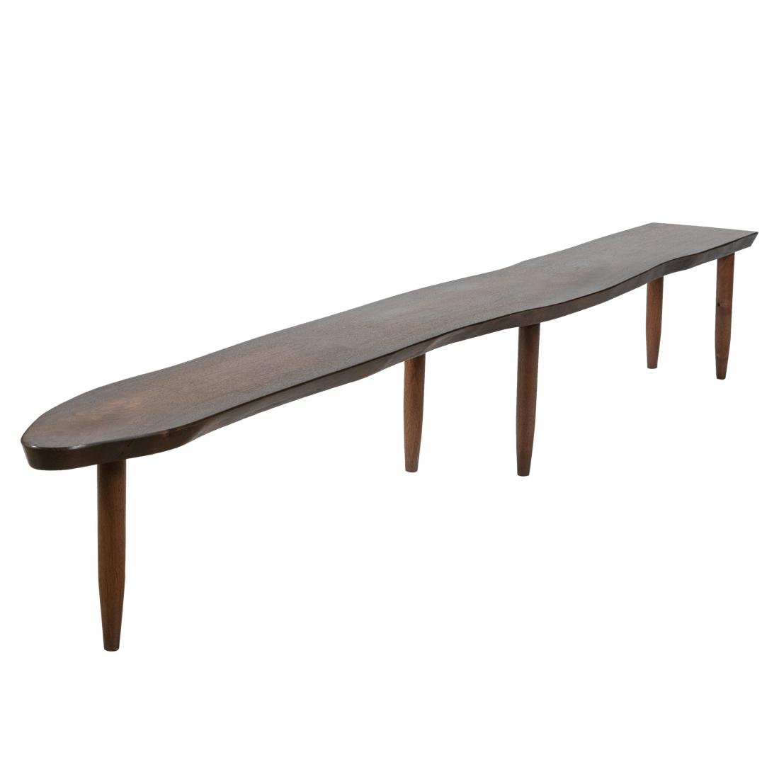 Phillip Lloyd Powell Style - Bryan Klotz Bench: Description - A large studio made walnut bench by Bryan Klotz (Klotzwrk) in the manner of Phillip Lloyd Powell. Stamped on underside. Dimensions - 14.5" x 101" x 12"