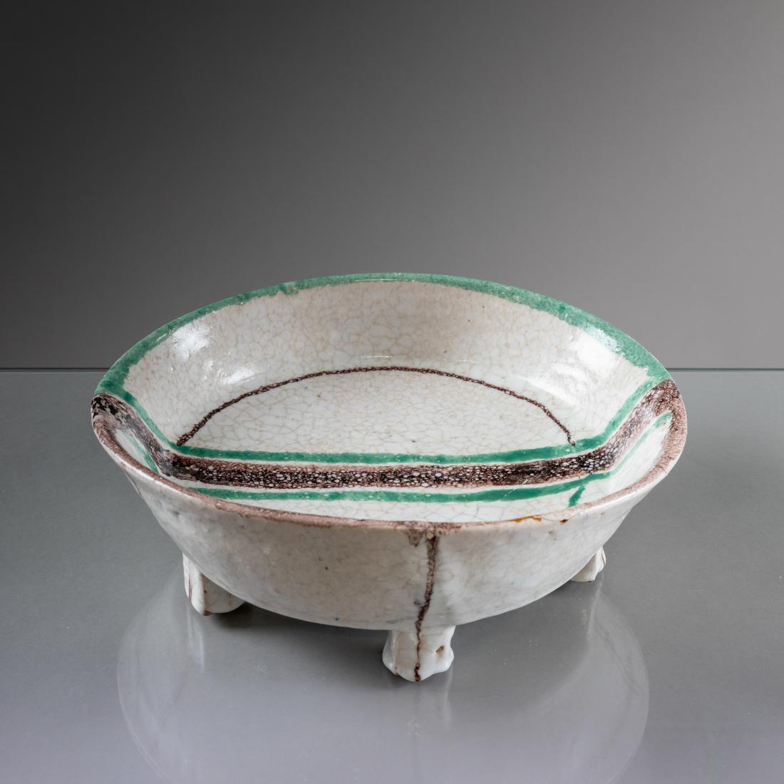 Raymor - Italy - Pottery Bowl: Description - Large footed glazed earthenware bowl. Signed on bottom "CP 62 Italy Raymor." Also with sticker label. Dimensions - 4" x 11"