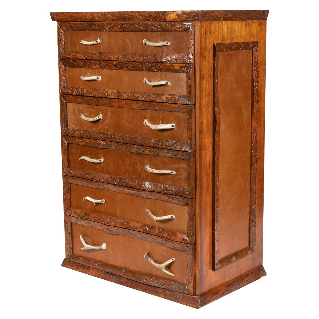 Carved Wood and Leather High Chest: Description - Southwestern motif carved wood and leather chest with antler handles Dimensions - 54.5" x 37.5"
