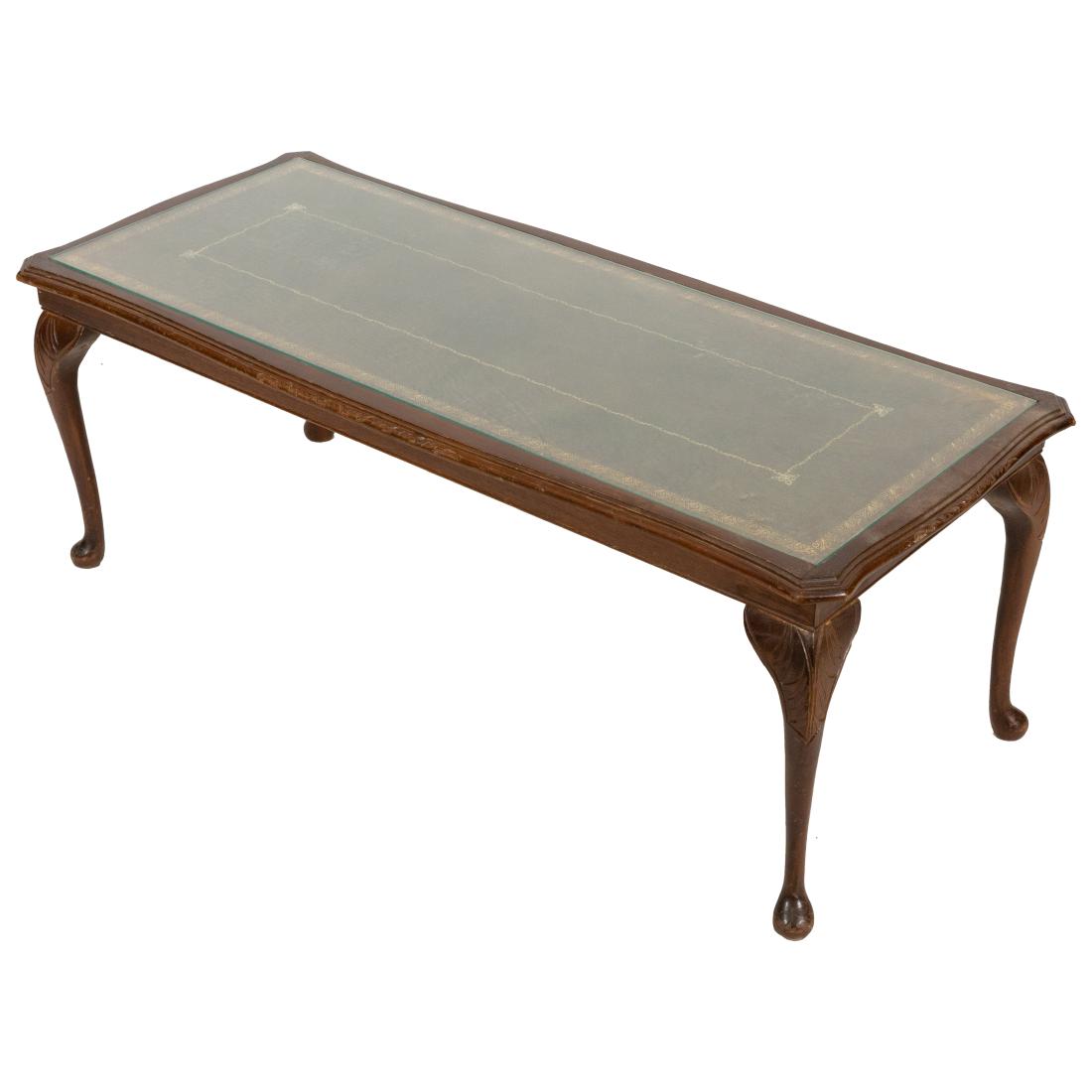 Leather Top Coffee Table: Description - Leather top coffee table Dimensions - 17" x 45" x 20"