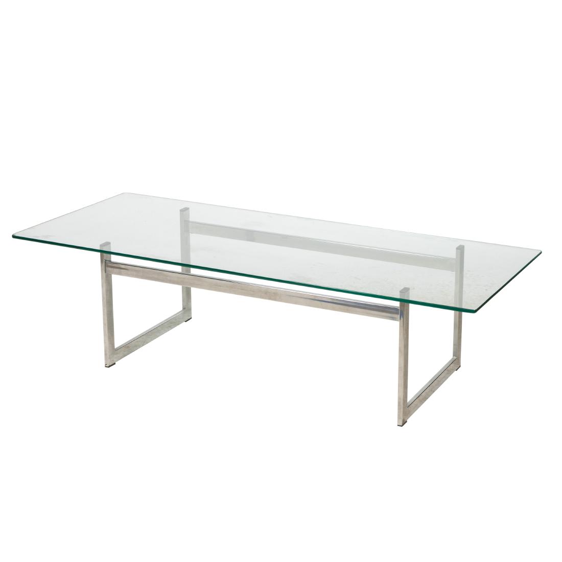 Chrome and Glass Coffee Table: Description - Chrome and glass coffee table. Dimensions - 16" x 60" x 24.5"
