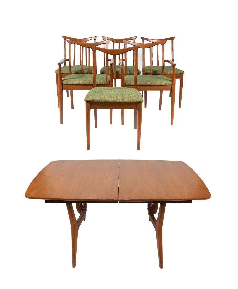 Mid Century Walnut Dining Table and 6 Chairs: Description - Mid century walnut dining room table and 6 chairs. Dimensions - Table 30" x 60" x 39" Arm 33" x 24" x 18"