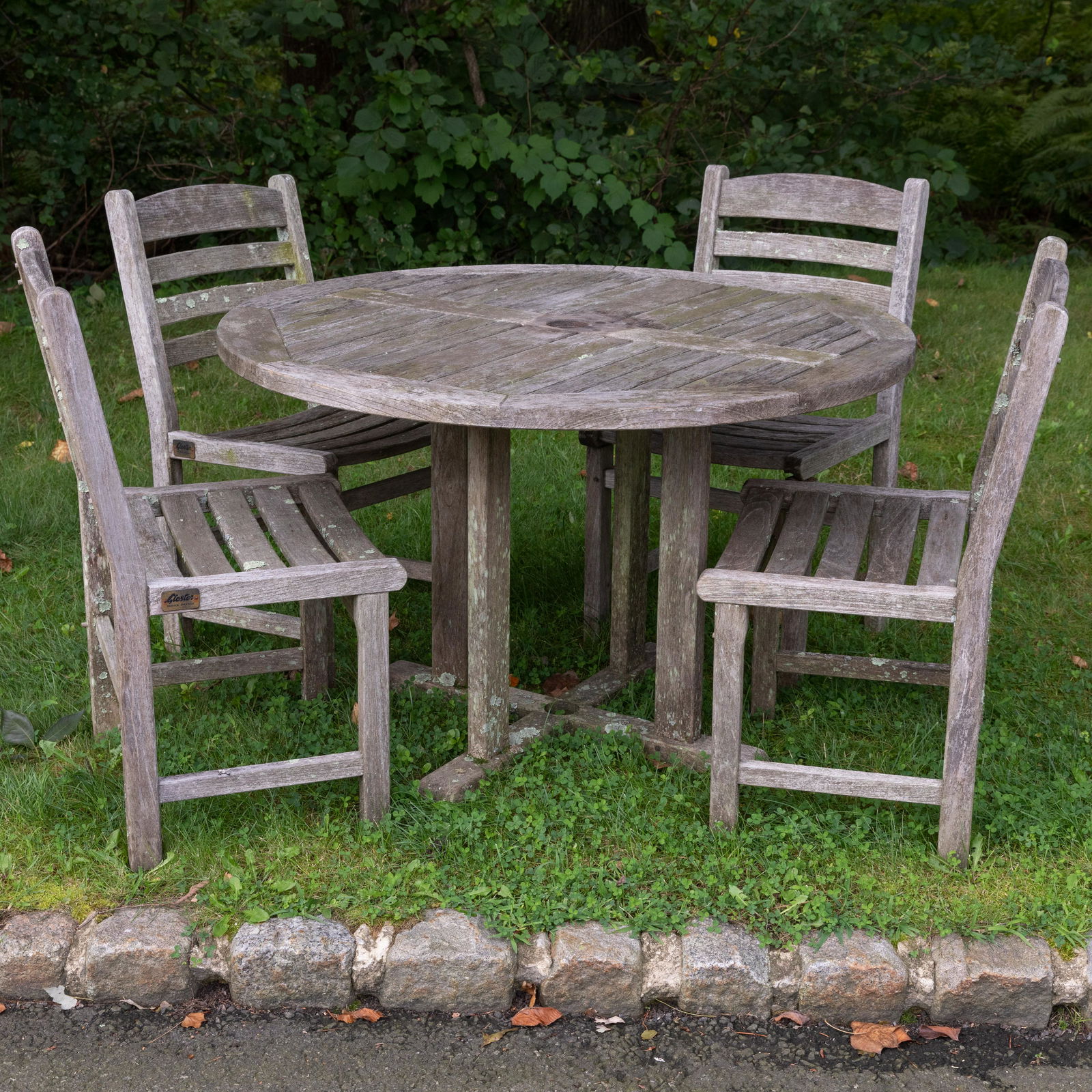 Gloster England - Teak Table and 4 Chairs: Description - Gloster England teak table and 4 chairs. Dimensions - table - 29" x 43"