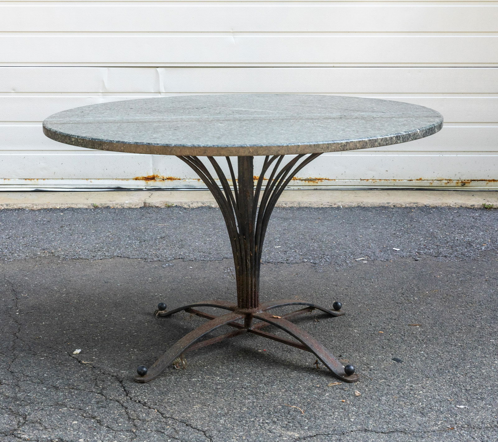 Iron and Granite Table: Description - Iron and granite table. Dimensions - 29.5" x 48.5"
