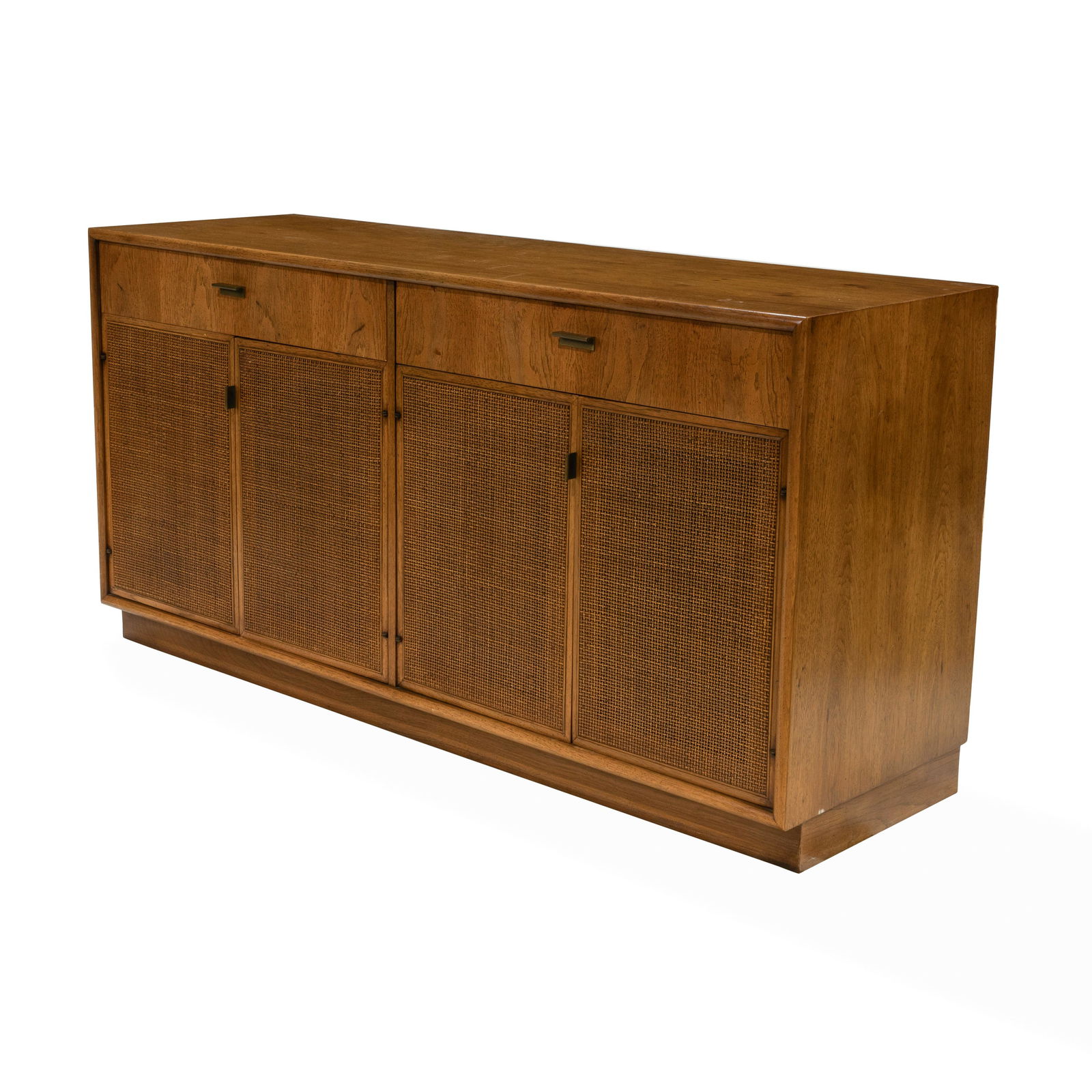 Jack Cartwright - Founders - Credenza: Description - Jack Cartwright for Founders credenza with cane front doors. Left doors contain three drawers. The right two doors would contain a shelf but it is not present. Dimensions - 30" x 60" x 1