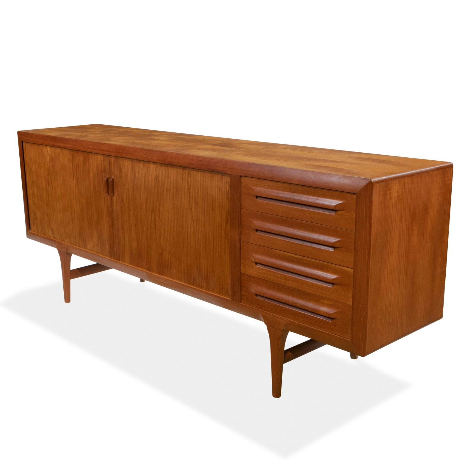 Kofod Larsen - Model FA33 Credenza: Description - A teak model FA33 tambour door credenza by Kofod Larsen for Faarup. Dimensions -34" x 87" x 19"