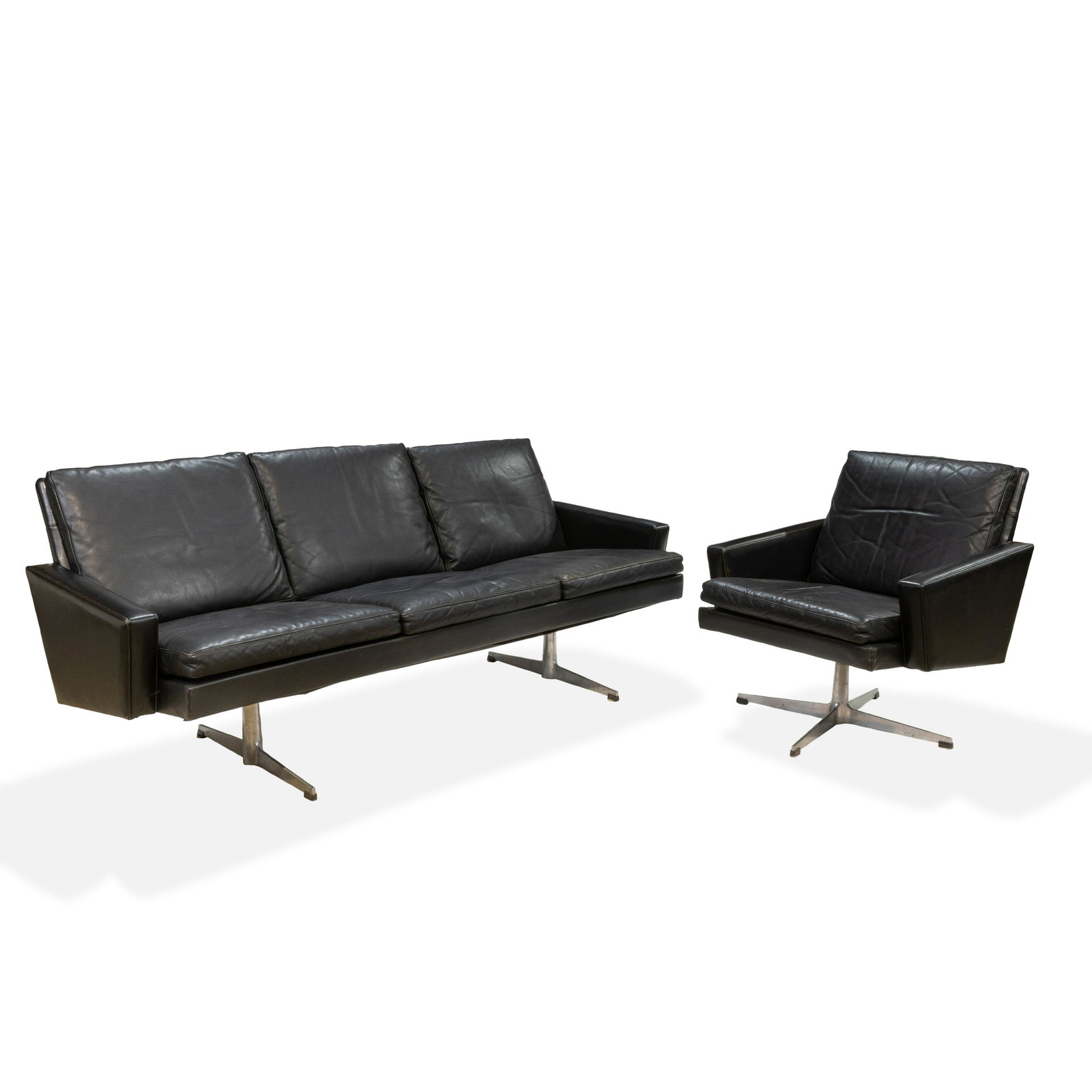Danish Leather Sofa and Lounge Chair: Description - A Danish leather sofa and lounge chair. Dimensions - Sofa - 27" x 70" x 28"