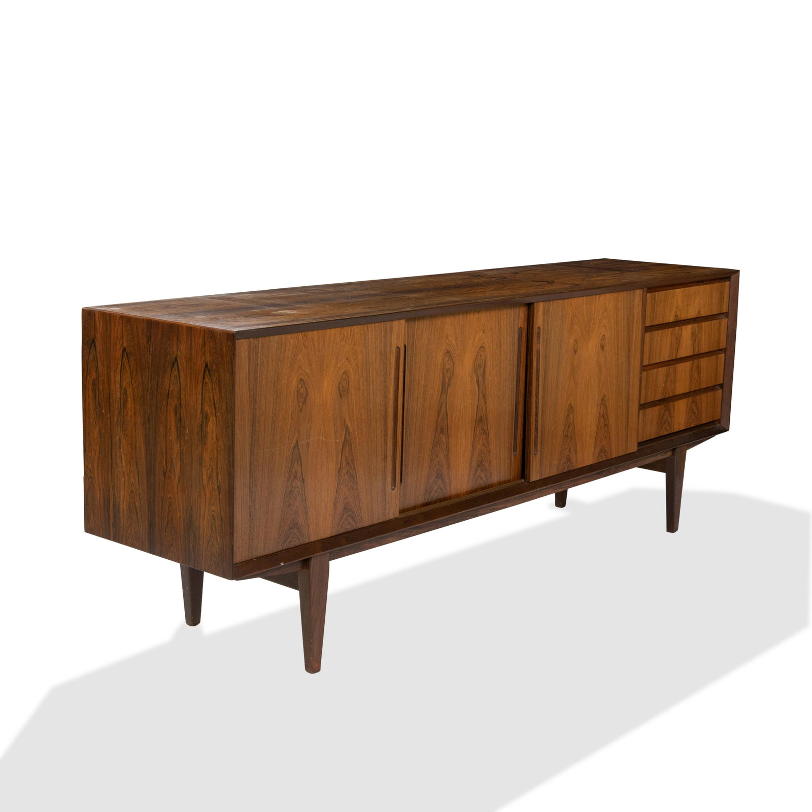 Danish Rosewood Credenza: Description - A Danish rosewood credenza with three sliding doors. Dimensions - 29.5" x 79" x 18"
