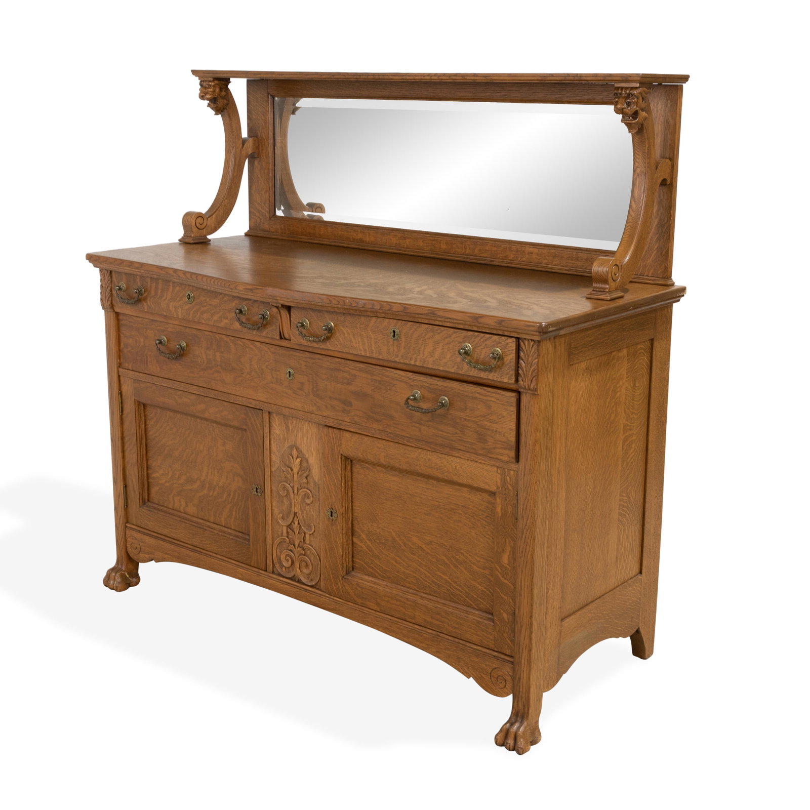 Oak Sideboard: Description - Oak sideboard with lions heads and paw feet. Dimensions - 56" x 57.5" x 24"