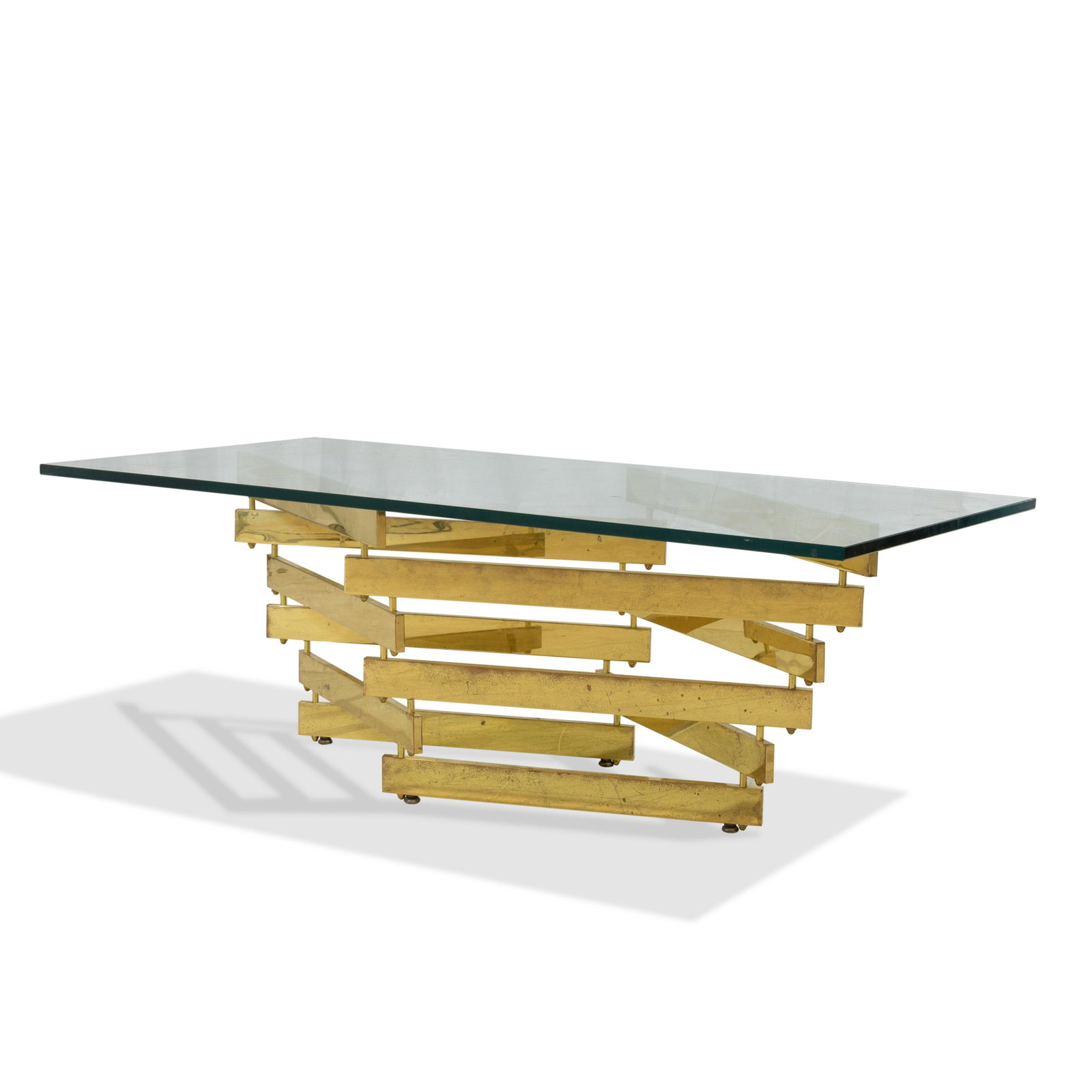 Brass and Glass Coffee Table: Description - Brass and glass coffee table. Dimensions - 17" x 48" x 24"