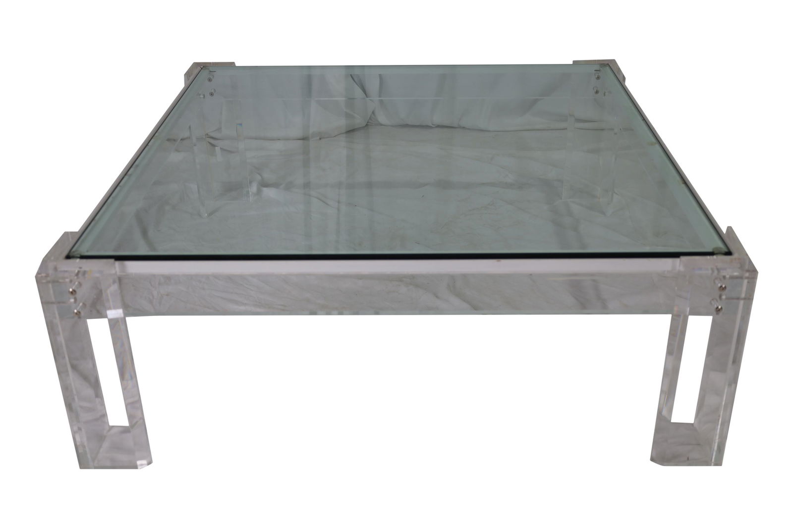 Lucite and Glass Coffee Table: Lucite and glass coffee table. Dimensions - 17" x 46"