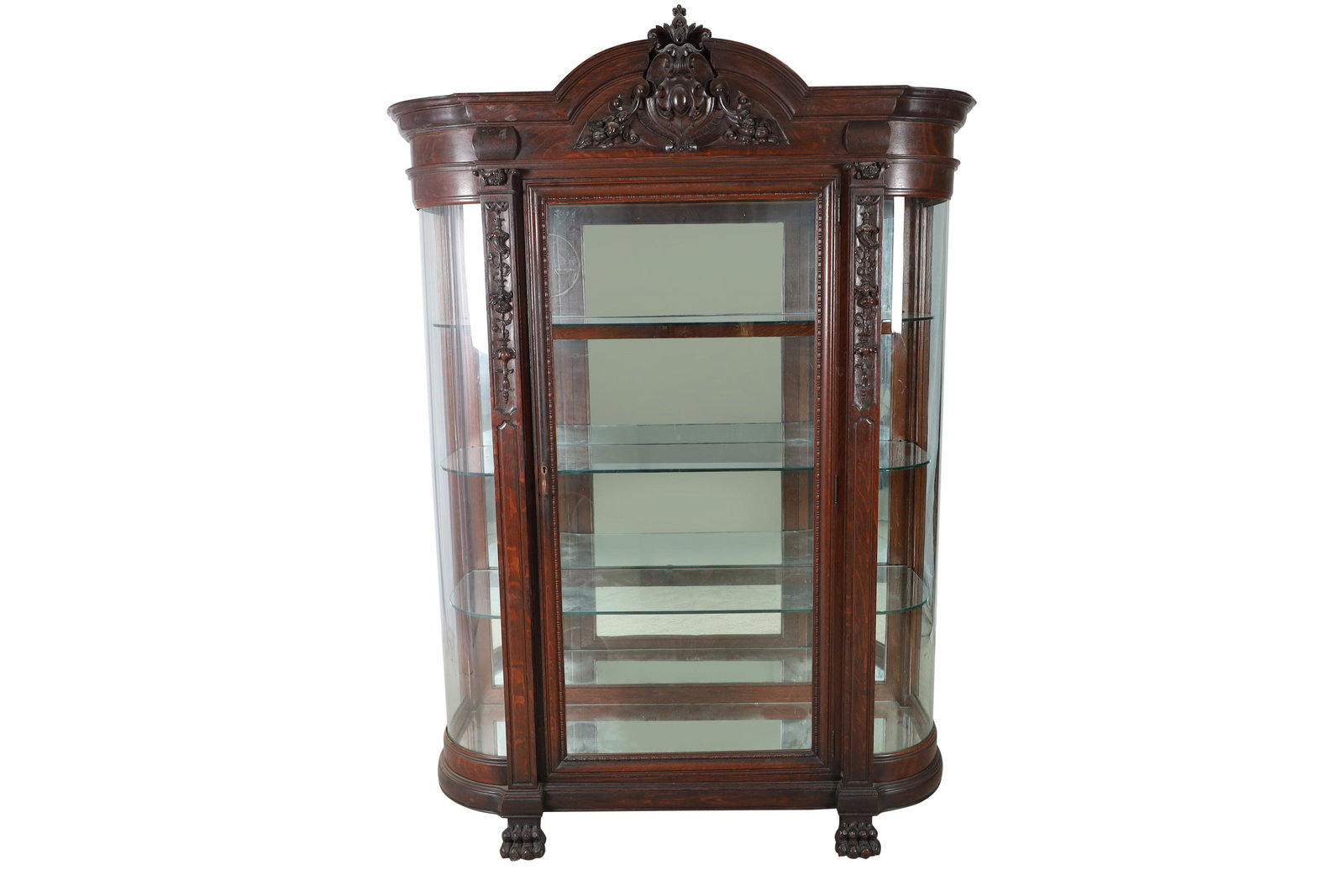 Heavily Carved Oak Claw Foot China Closet: Heavily Carved Oak Claw Foot Curved Glass China Closet with mirrored back. Dimensions 77x50x22