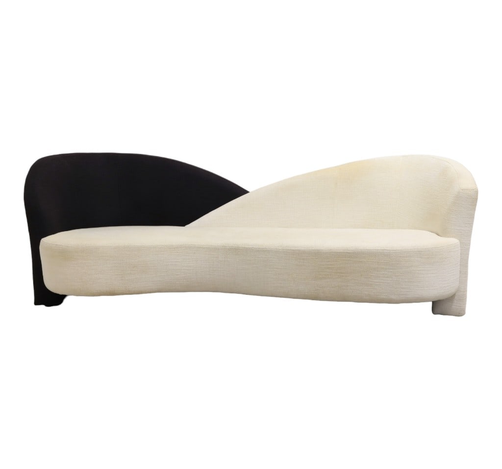 1980's Sculpted Sofa: A 1980's black and white sculptured sofa Dimensions:36x100x39