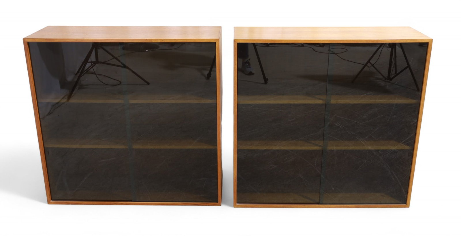 Danish Teak Cabinets - Pair: A pair of Danish teak cabinet with smoked glass sliding doors with 2 teak shelves in each cabinet Dimensions:37x38x14