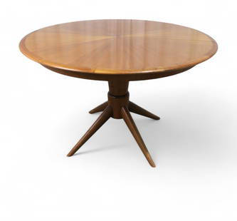 Melchiorre Bega Dining Table: A Melchiorre Bega dining table on turned column base with 4 tapered legs with 3 18" leaves Dimensions:29x46
