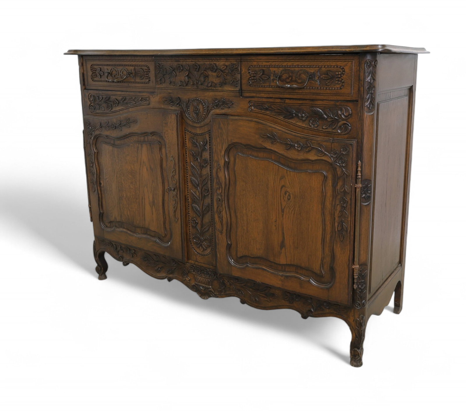 Antique Carved Wood French Sideboard: An Antique French carved sideboard Dimensions:44.5x59x22