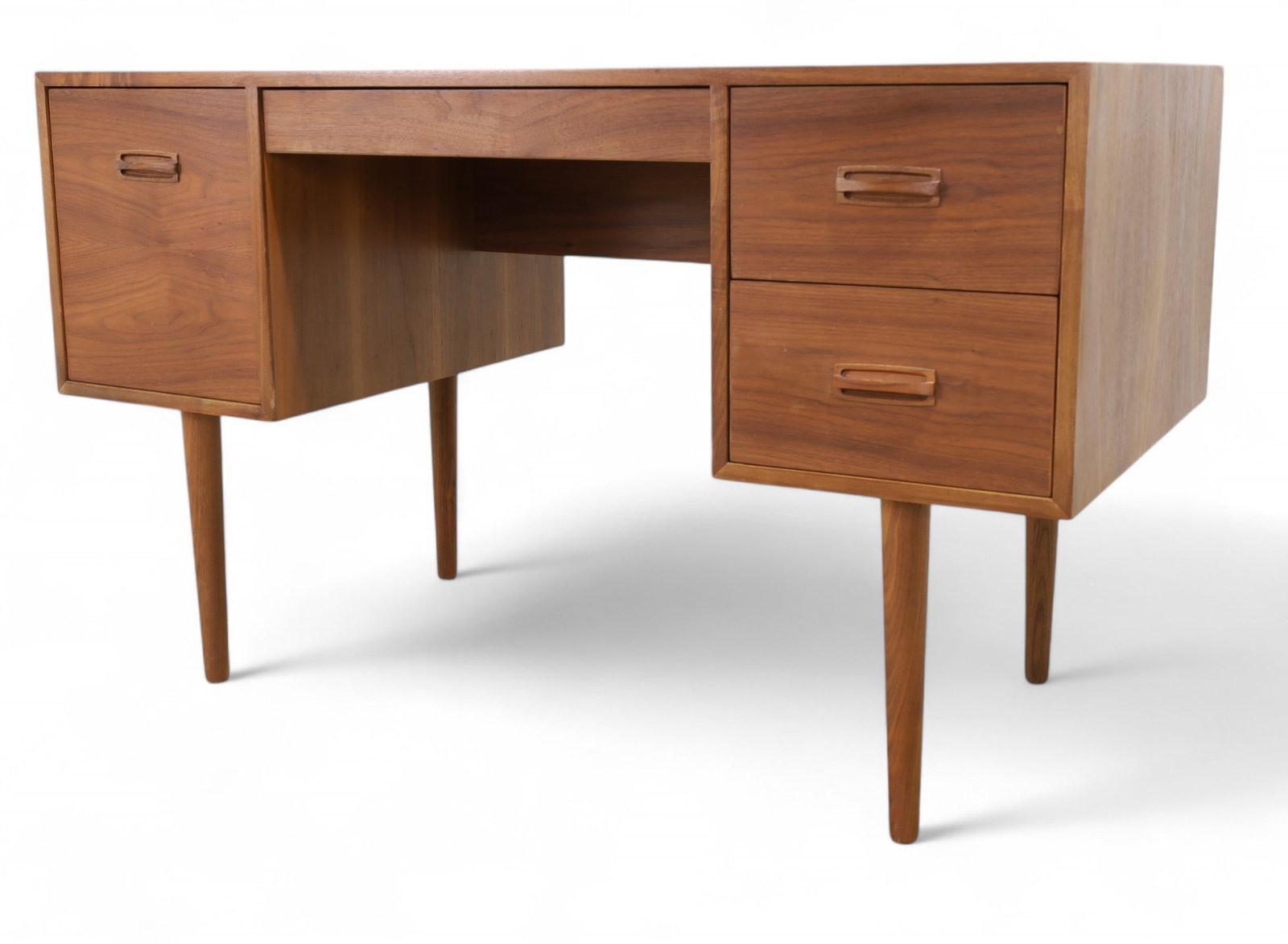 Danish Teak Desk: A Danish teak desk with sculpted pulls Dimensions:29x48x24