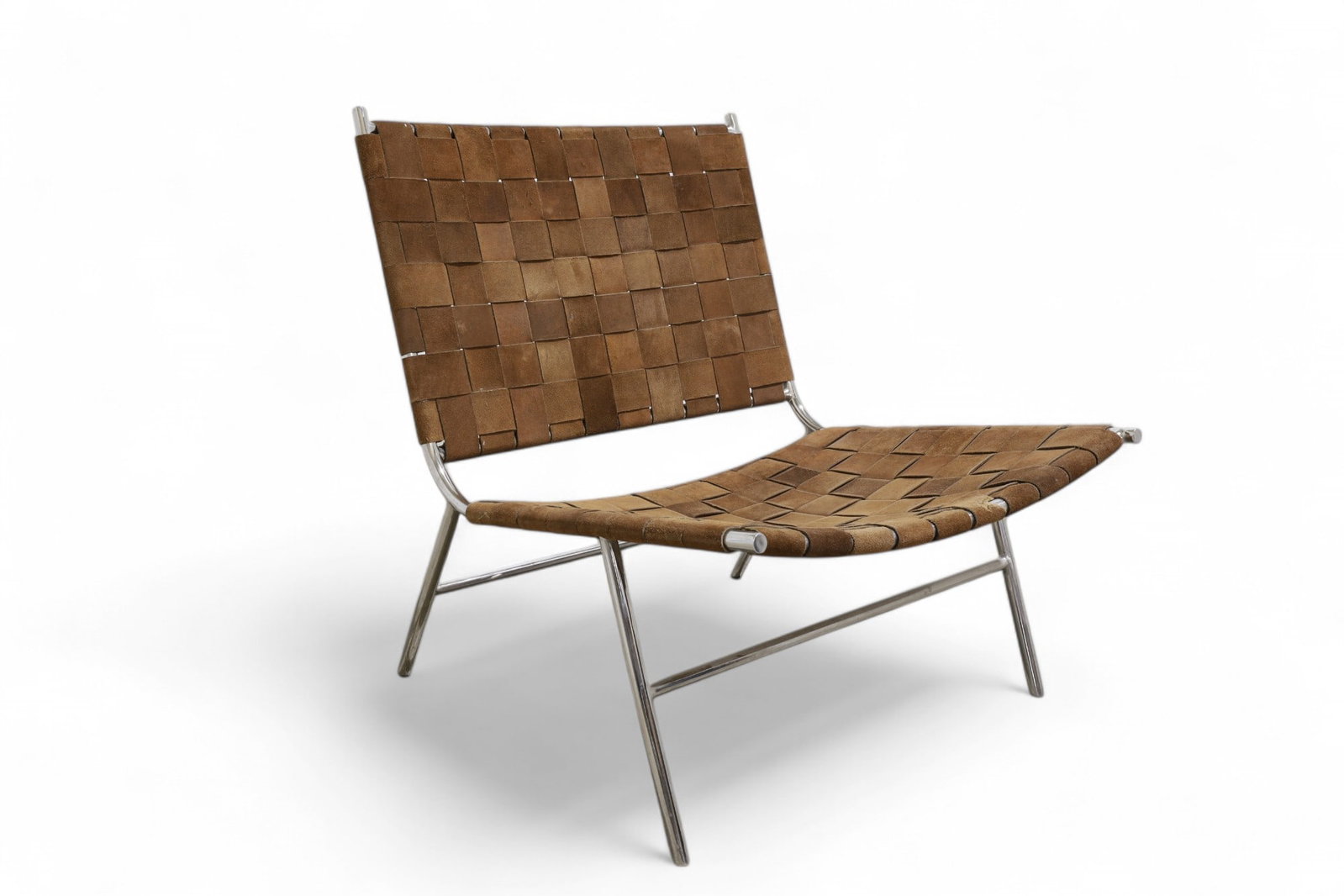 Chrome & Woven Leather Lounge Chair: A woven leather lounge chair on chrome frame Dimensions:30x25x29 Seat Height:13