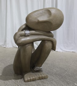 Composite Sad Man Sculpture