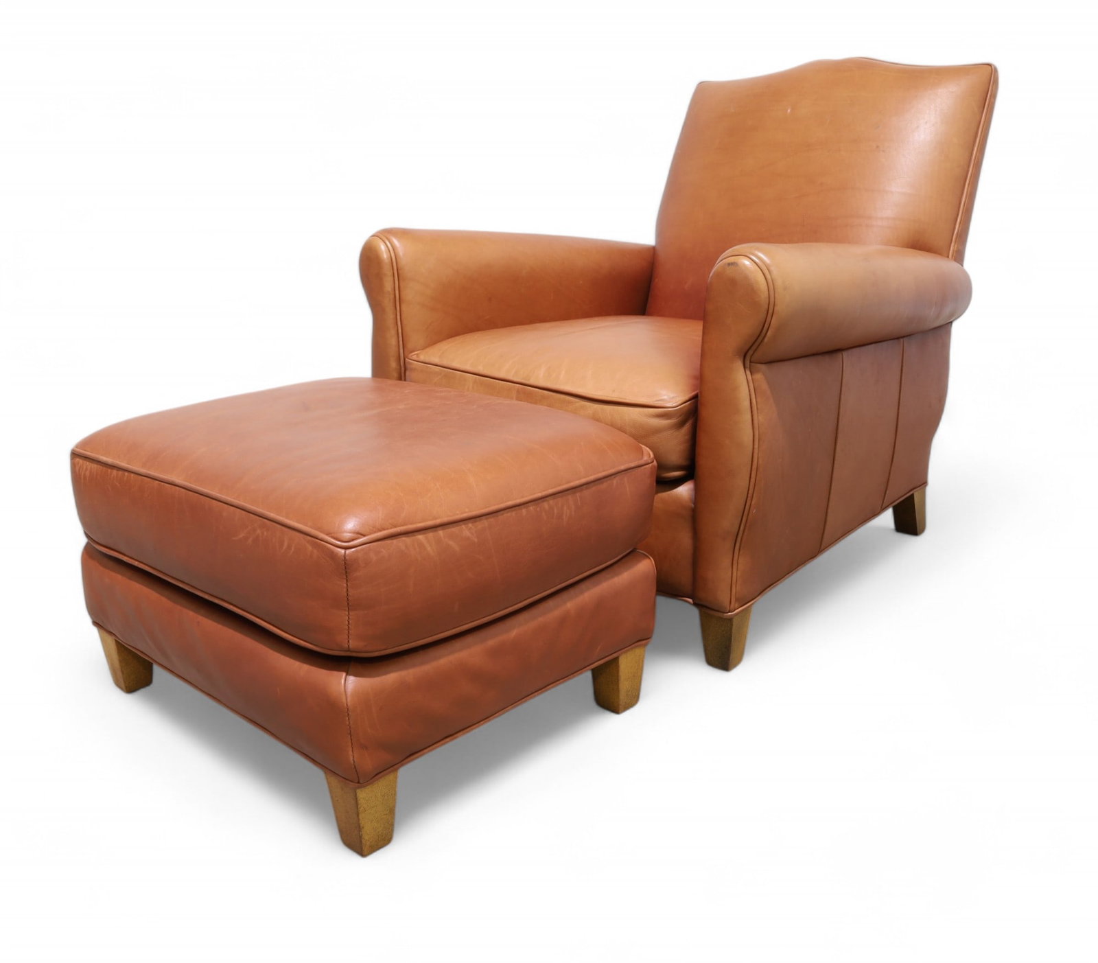 Leather Club Chair & Ottoman: A leather club chair and ottoman Dimensions:33x32x34 Seat Height:16 Ottoman:15x25x20