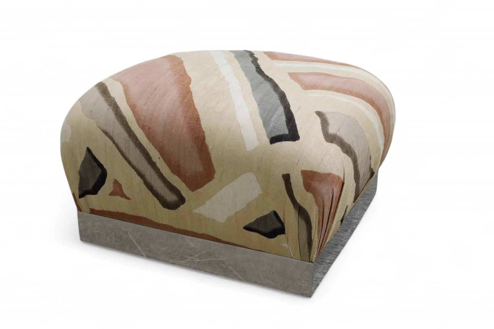 Pouf Ottoman on Chrome Base: An upholstered pouf ottoman on chrome base Dimensions:17.5x22