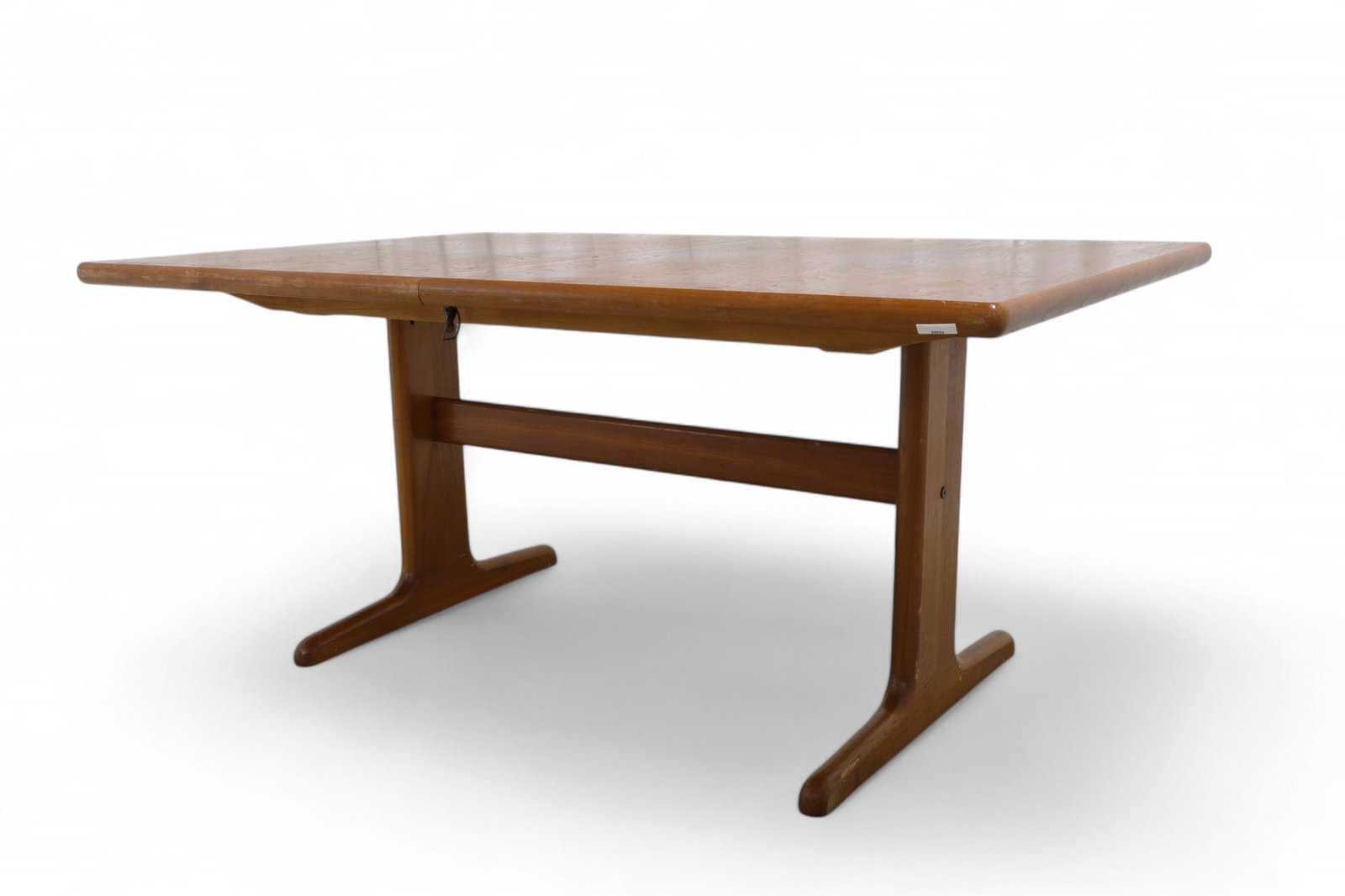 Danish Teak Dining Table: A Danish teak dining table with 1 32"leaf Dimensions:29x65x41