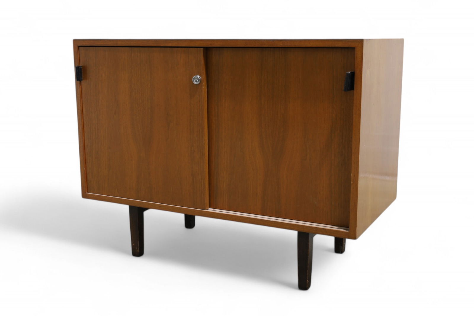 Knoll Compact Credenza: A Knoll compact credenza with laminate top and leather pull Dimensions:28x36x18