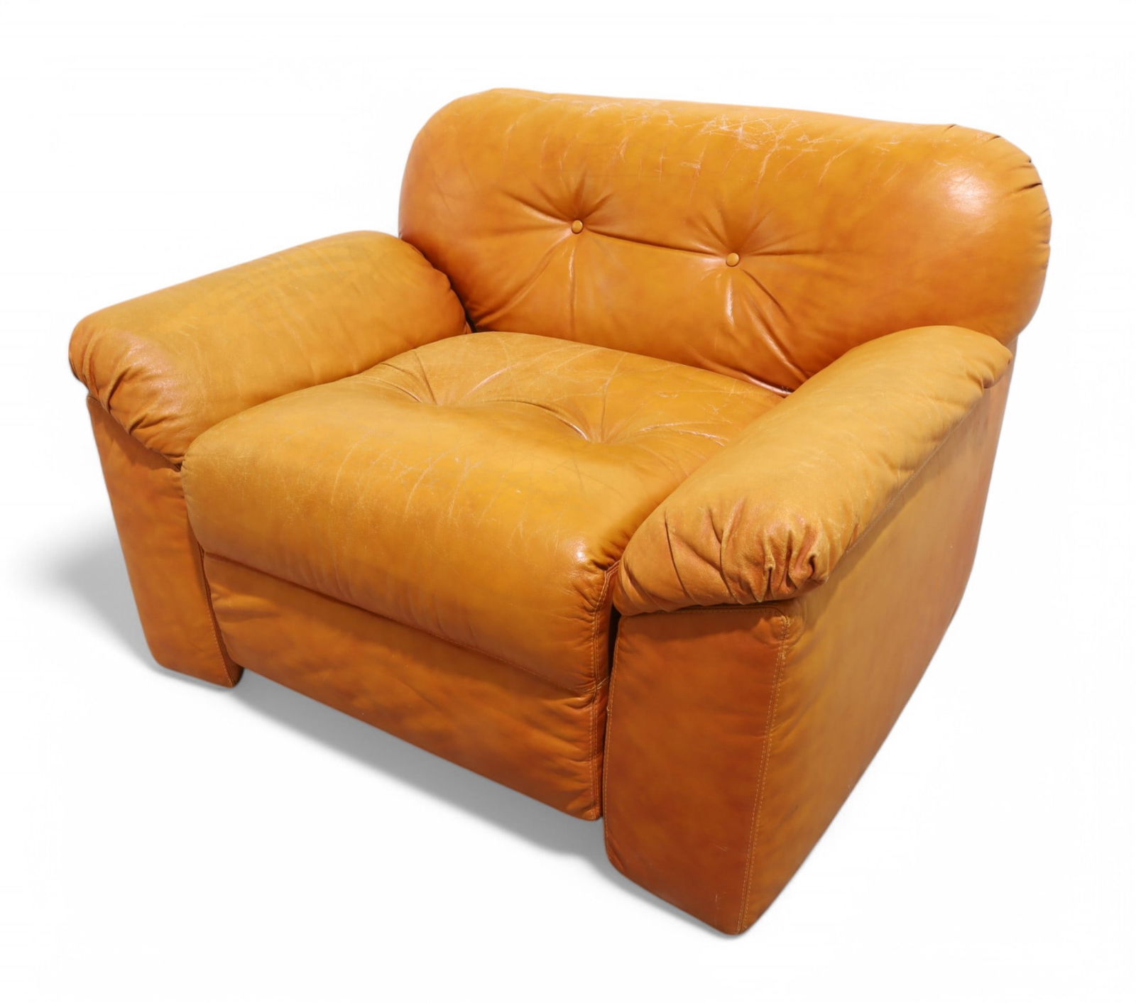 Vintage Sormani Leather Club Chair: A vintage Sormani leather club chair on casters Dimensions:27x40x31 Seat Height:17