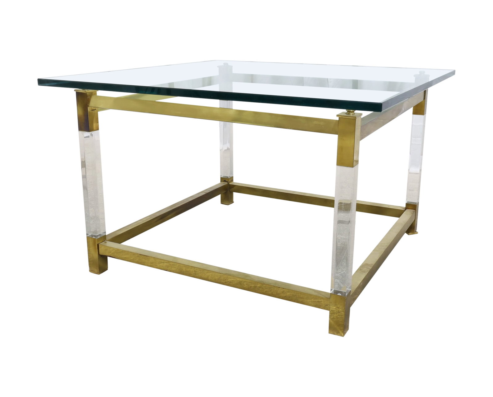 Lucite Brass & Glass Coffee Table: A lucite, brass and glass coffee table Dimensions:22x36x36