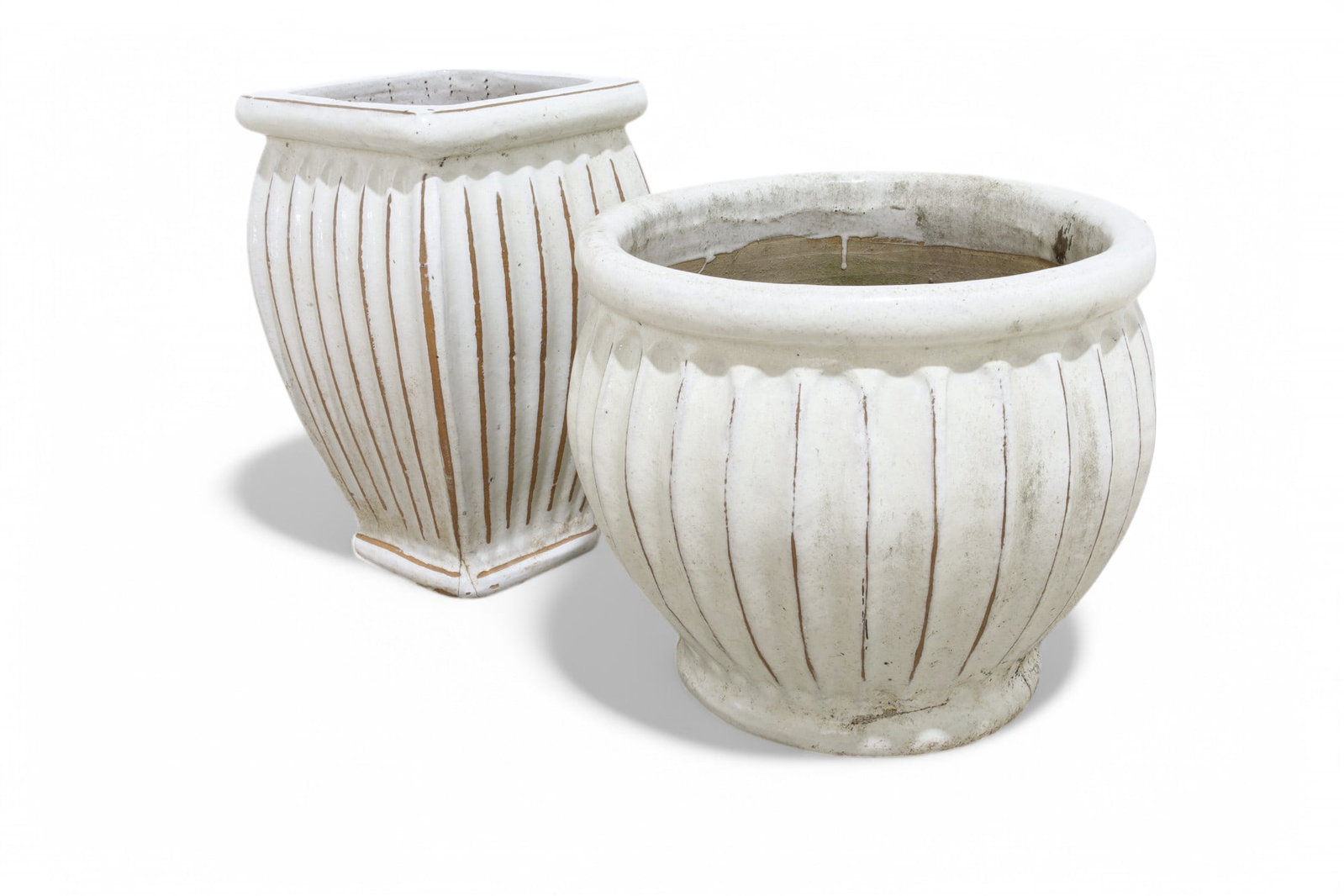 Faceted Pottery Planters 2: A set of 2 faceted glazed pottery planters, one round and one square Dimensions:19x11.5 Dimensions:16 x18