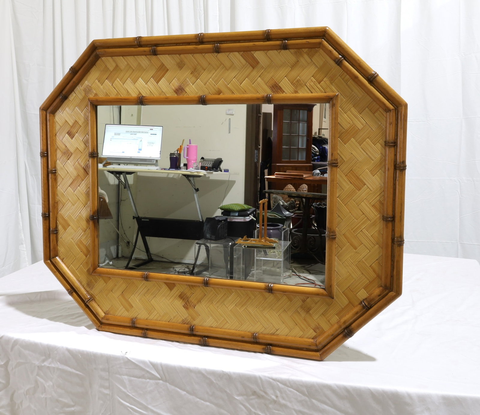 Faux Bamboo Wall Mirror: A faux bamboo wall mirror Dimensions:28x34x