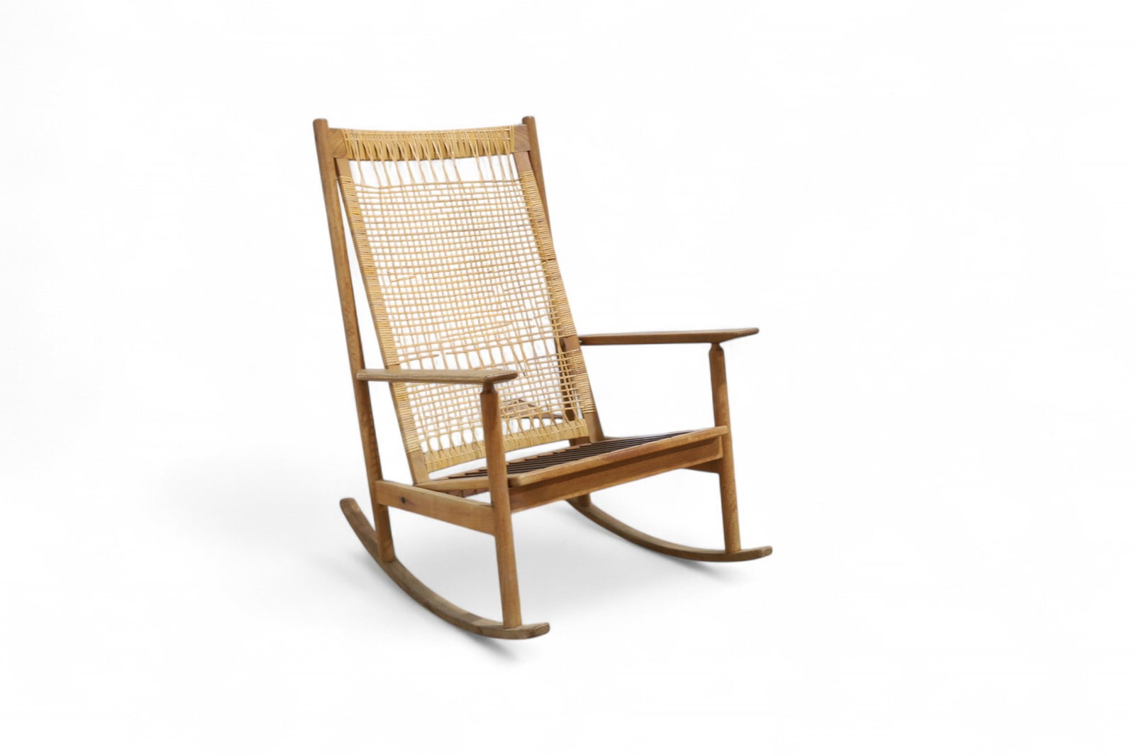 Hans Olsen Rocker: A Hans Olsen Danish teak rocking chair with woven back Dimensions:40x26x34