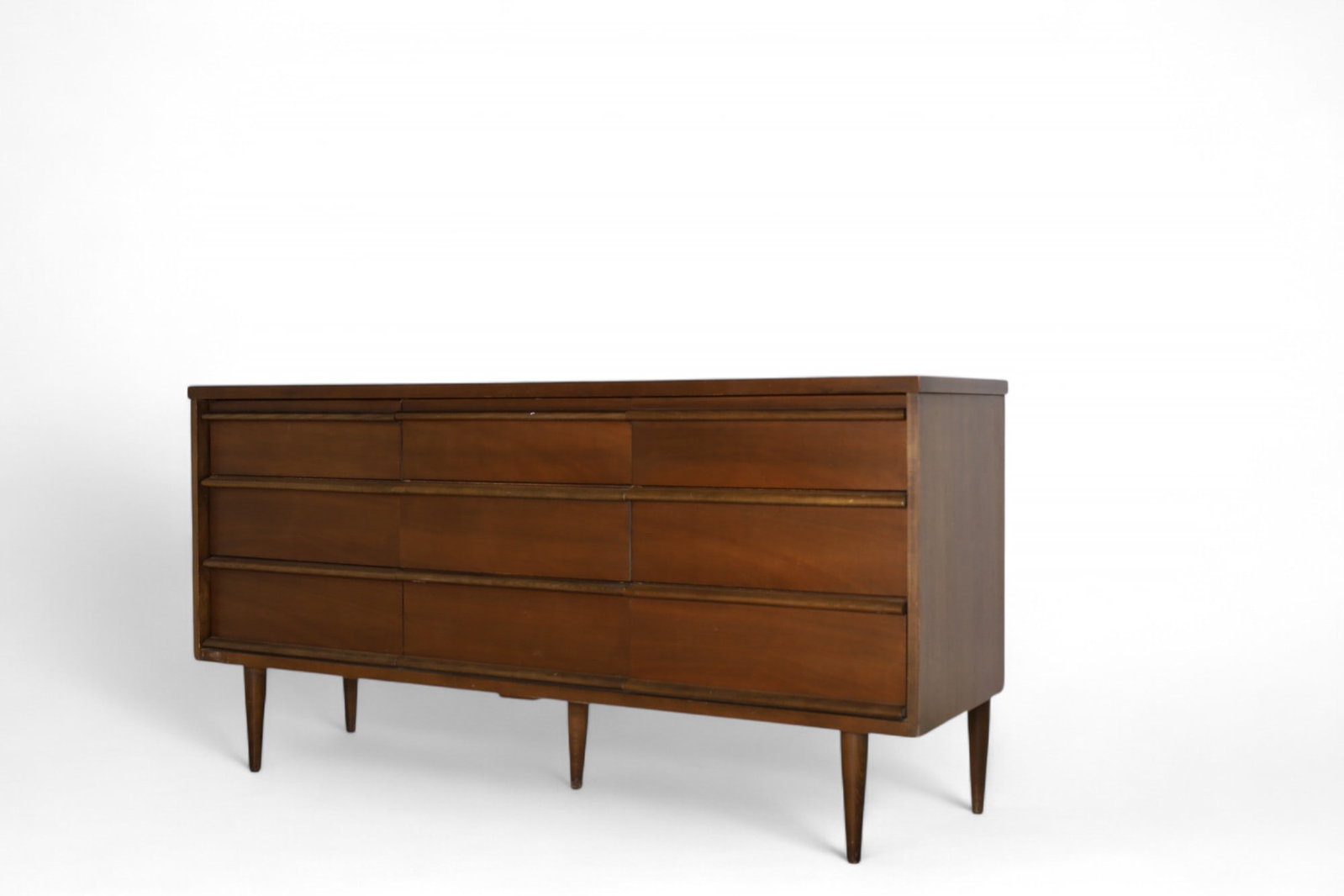 Bassett Mid Century Long Dresser: A Basset walnut mid century 9 drawer long dresser Dimensions:30x60x18