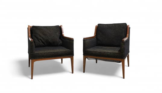 Mid century Modern Lounge Chairs - Pair: A pair of upholstered lounge chairs with wood trim and original upholstery Dimensions:29x24x27 Seat Height:14