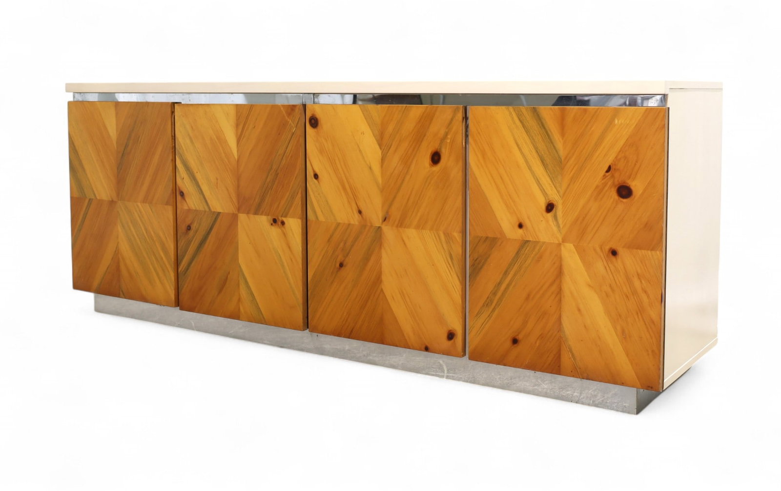 1980's Lacquer Wood & Chrome Credenza: A 1980's lacqured credenza with wood doors and chrome accents Dimensions:30x78x19