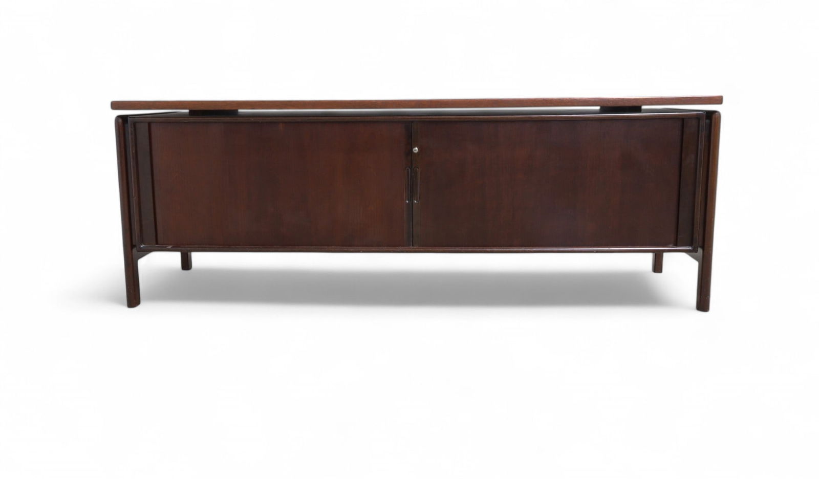 Dyrlund Rosewood Tambour Credenza: A Dyrlund rosewood credenza with tambour door Dimensions:27x76x24