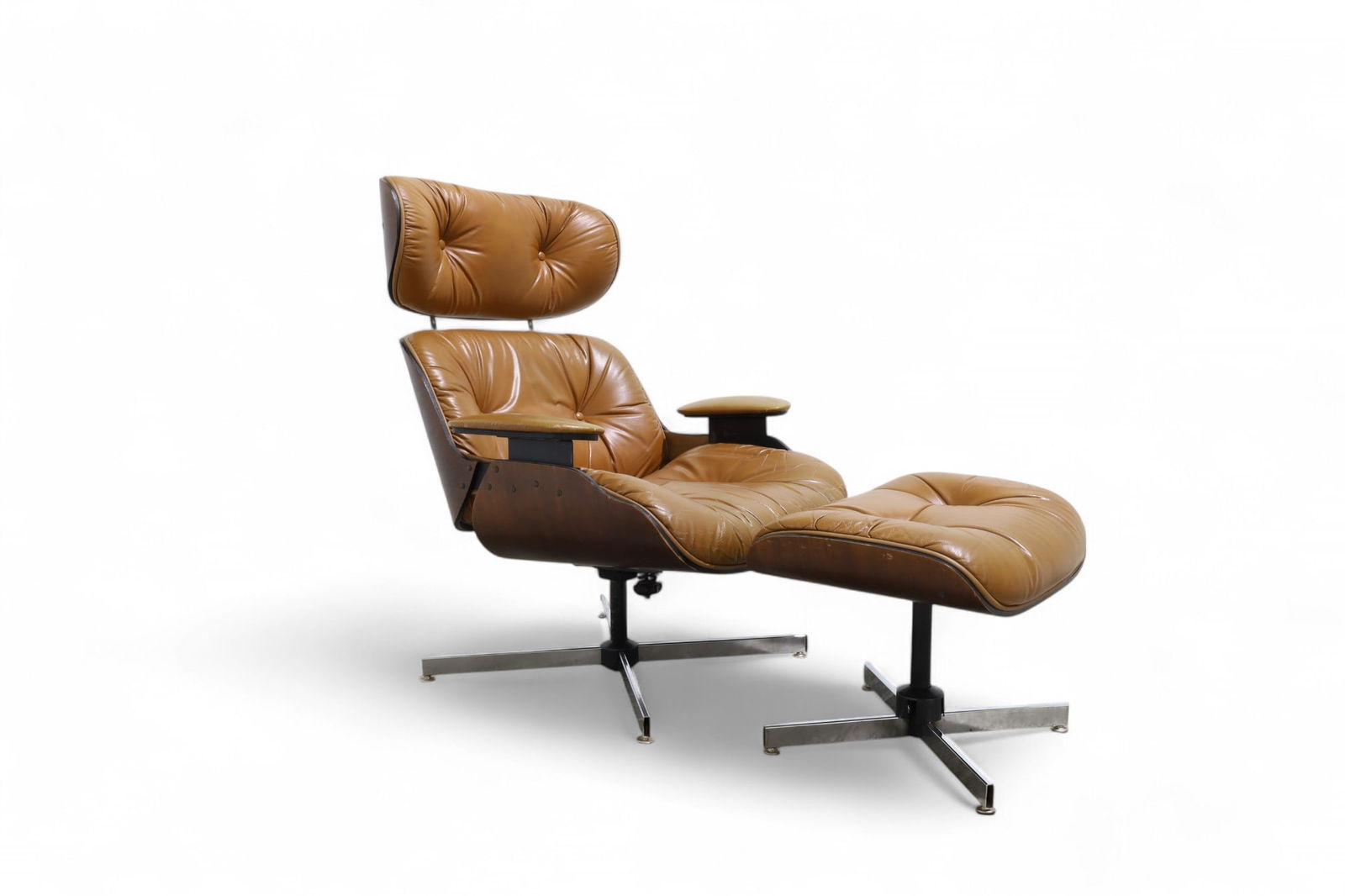 Plycraft Chair & Ottoman: A Plycraft chair and ottoman Dimensions:39x32x31 Seat Height:16