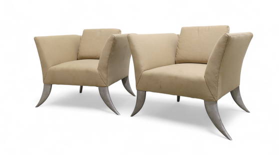 Saber Leg Lounge Chairs - Pair: A pair of Saber leg lounge chairs Dimensions:28x34x28 Seat Height:17