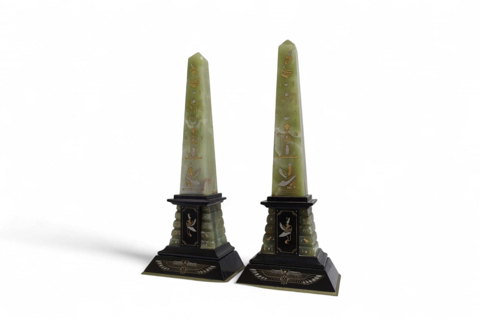 Egyptian Motif Obelisk - Pair: A pair of onyx Egyptian motif obelisks on marble bases Dimensions:7.5x7x4