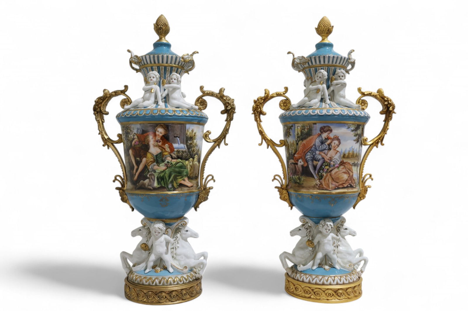 Sevres Style Porcelain Urns - Pair: A pair of Sevres style porcelain urns Dimensions:26x14