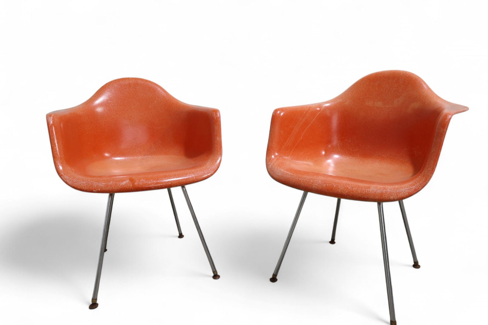 Modernica Shell Arm Chairs - Pair: A pair of Modernica shell arm chairs Dimensions:32x24.5x21